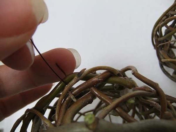Hook brown wire around the biggest most secure willow twig Hook brown wire around the biggest most secure willow twig