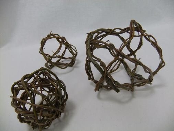 One sphere done, one with just a few connected wreaths and one almost done One sphere done, one with just a few connected wreaths and one almost done