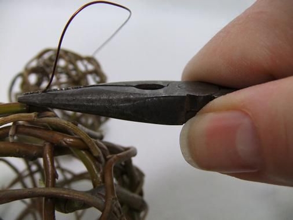 Tie the wire to the second sphere Tie the wire to the second sphere