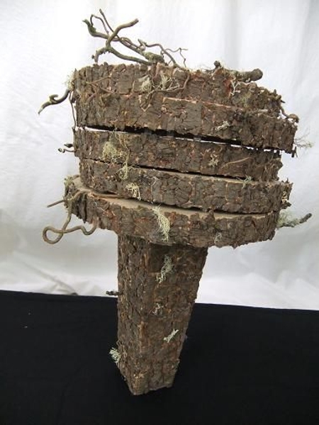 Cover cardboard and metal shapes to create a natural looking armature. Cover cardboard and metal shapes to create a natural looking armature.