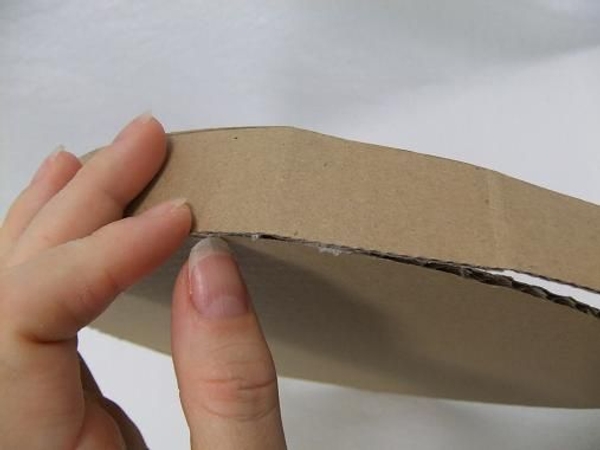 Fold the cardboard to curve Fold the cardboard to curve