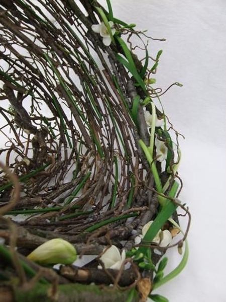 Freesia, grass and twigs. Freesia, grass and twigs.