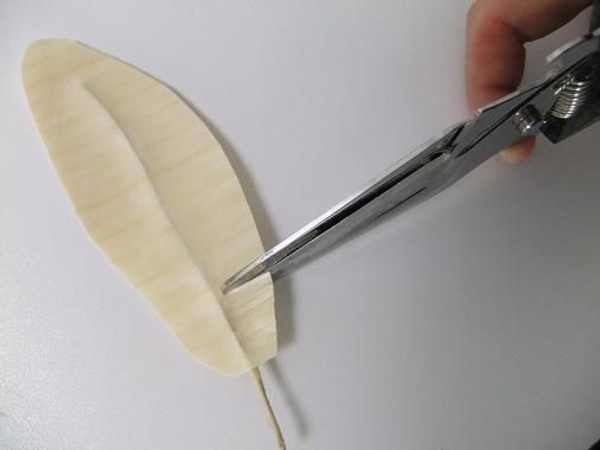 Cut from the outside in to the wire. Cut from the outside in to the wire.