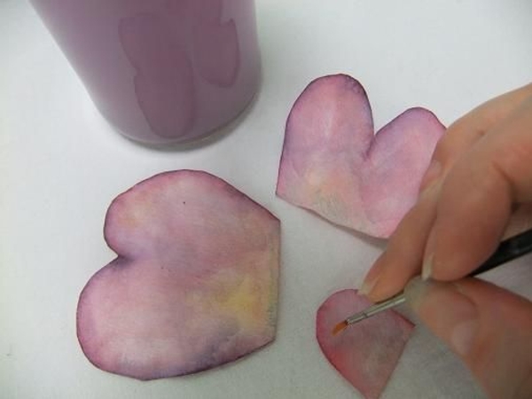 Paint the coffee filter petals with water colour paint Paint the coffee filter petals with water colour paint