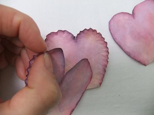 Ruffle the coffee filter sweet pea petal by pinching the edges Ruffle the coffee filter sweet pea petal by pinching the edges