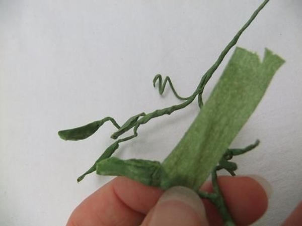 Tape the bud or pod with florist tape Tape the bud or pod with florist tape