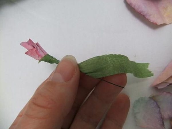 Tape the bud with florist tape Tape the bud with florist tape
