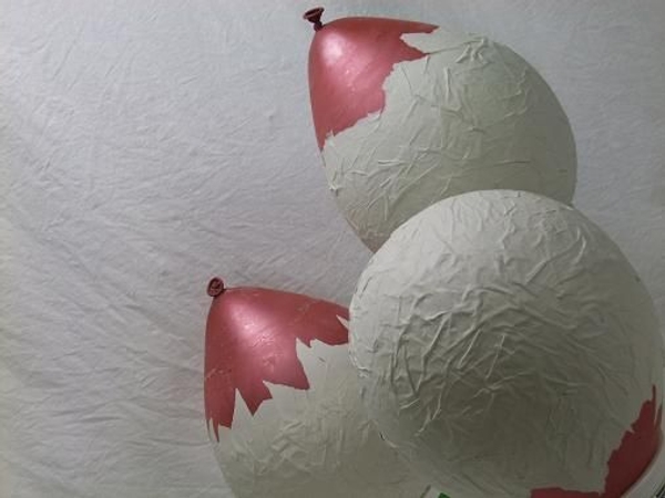 Turn the Papier Mache Easter eggs to make sure it dries. Turn the Papier Mache Easter eggs to make sure it dries.