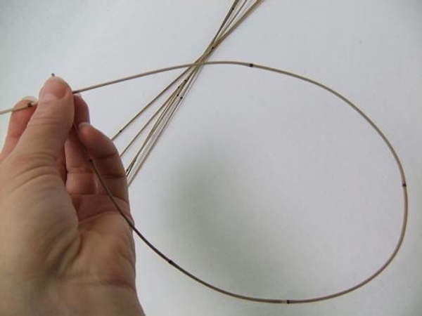 Bend a Mikado Reed to create a drop shape Bend a Mikado Reed to create a drop shape