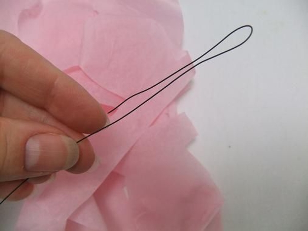 Fold a wire into a hair pin hook. Fold a wire into a hair pin hook.
