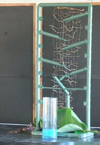 My Shishi Odoshi fountain from PVC pipe, sprayed green.jpg My Shishi Odoshi fountain from PVC pipe, sprayed green.jpg