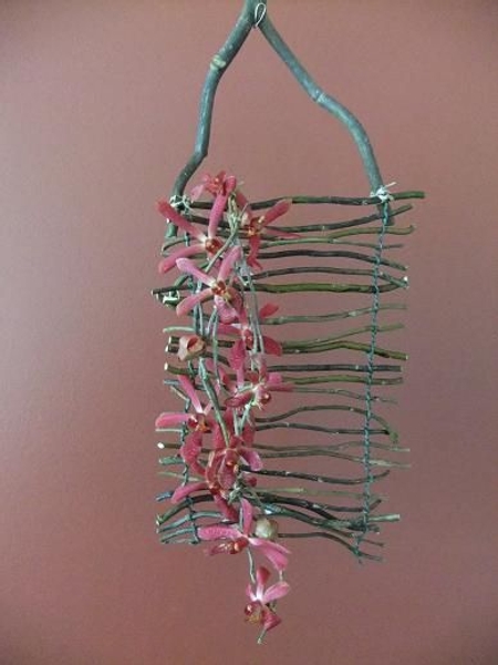 Willow twig blind with tiny Mokara orchids Willow twig blind with tiny Mokara orchids