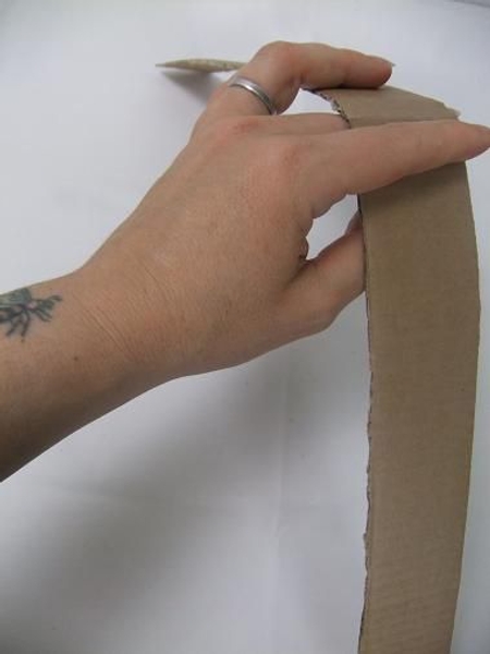 Break the strips by running it through your fingers. Break the strips by running it through your fingers.