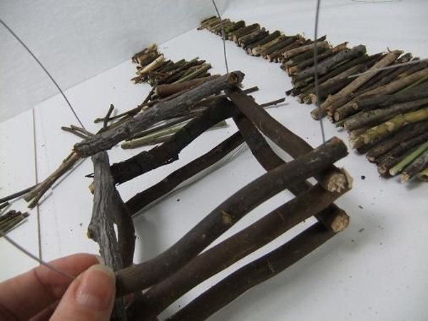 Continue to build up the twigs. Continue to build up the twigs.