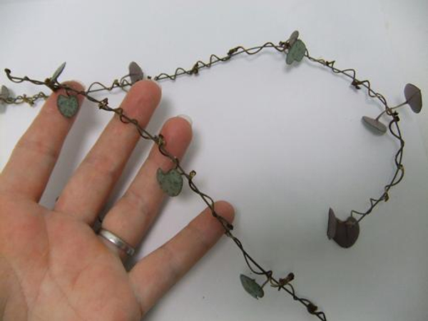 Delicate twig and rosary vine garland.