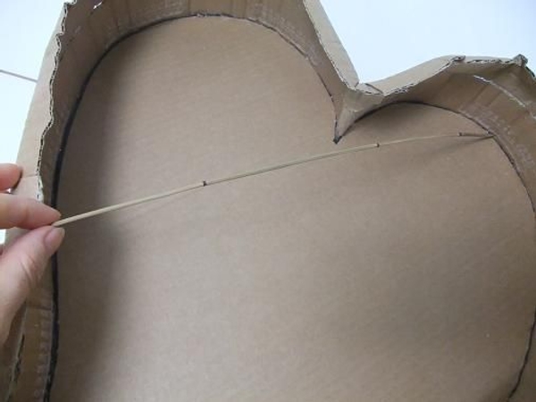 Glue reeds into the design to form a grid. Glue reeds into the design to form a grid.