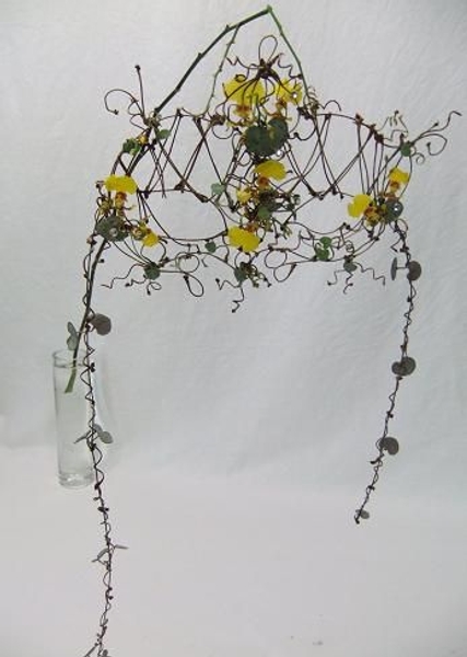 Intricate cherry twig, rosary vine and oncidium orchids. Intricate cherry twig, rosary vine and oncidium orchids.