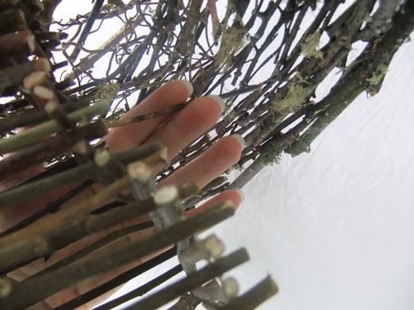 Pull the Mikado reed through to the other side. Pull the Mikado reed through to the other side.