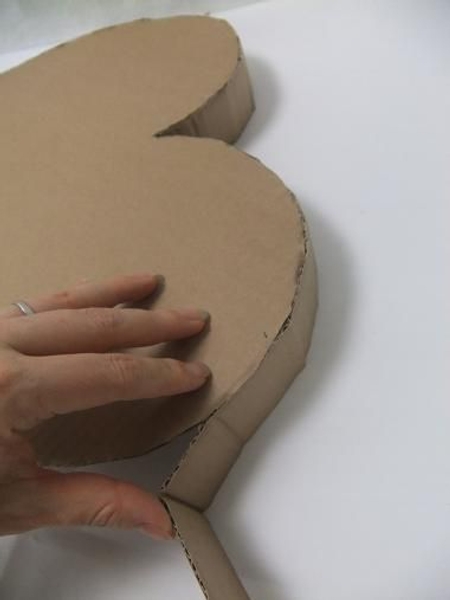 The thick cardboard folds easily. The thick cardboard folds easily.