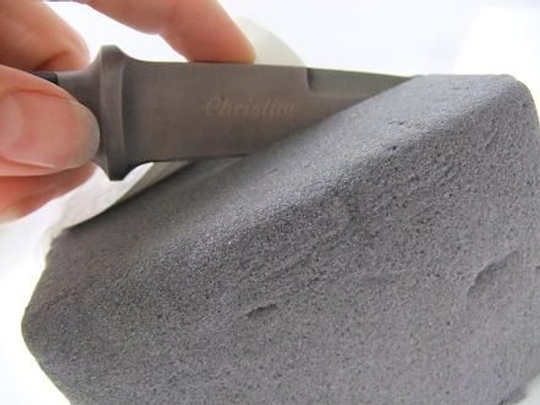 Cut a thick slice of Rainbow Oasis Floral Foam. Cut a thick slice of Rainbow Oasis Floral Foam.