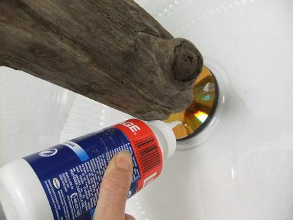 Pour out wood glue.