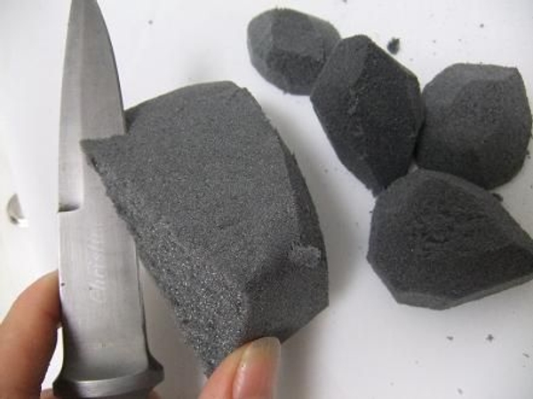 Roughly cut the shape of the pebble out of Rainbow Oasis. Roughly cut the shape of the pebble out of Rainbow Oasis.
