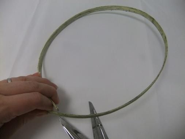 Shape the Midelino cane coils in a oval. Shape the Midelino cane coils in a oval.