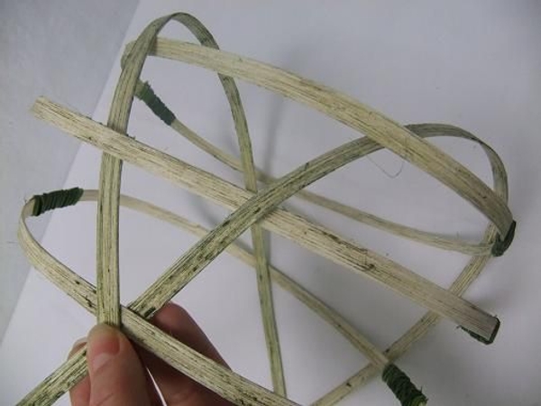 Spread out the cane sections to shape the basket. Spread out the cane sections to shape the basket.