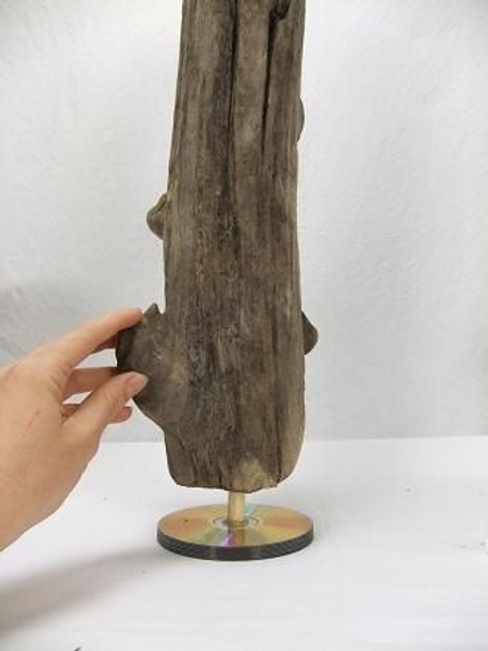 Stacked CD's as a base for a driftwood design. Stacked CD's as a base for a driftwood design.
