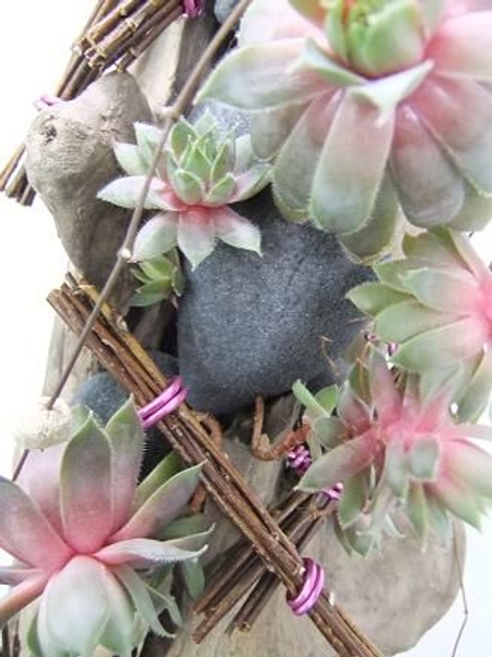 Trail long strands of rosary vine down the design. Trail long strands of rosary vine down the design.