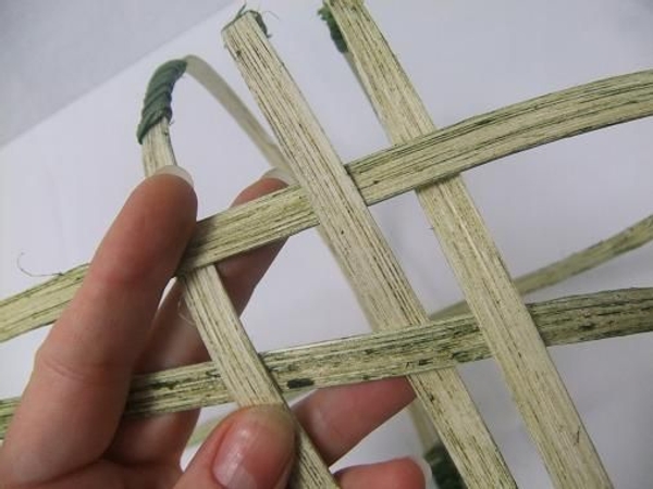 Weave in another length of cane Weave in another length of cane