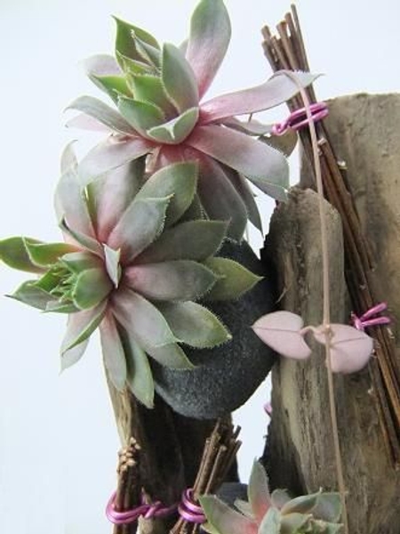 Wire twig bundles and floral foam pebbles.