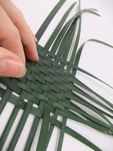Continue to add blades of grass. Continue to add blades of grass.