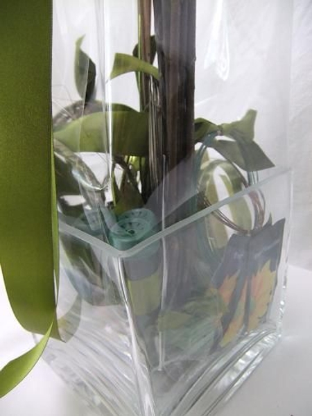 Gift basket filled with floral art supplies. Gift basket filled with floral art supplies.