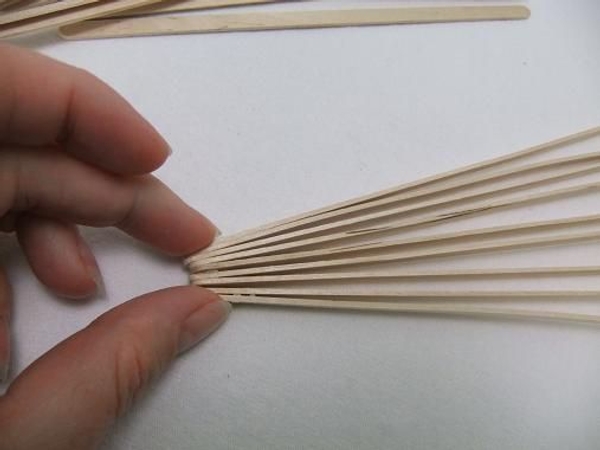 Glue a few more stir-sticks and set aside to dry Glue a few more stir-sticks and set aside to dry