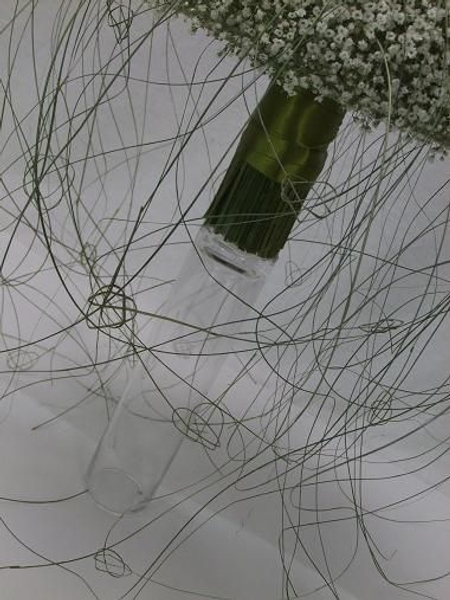 Puffs of Gypsophilla and ripped flax Celtic heart knots. Puffs of Gypsophilla and ripped flax Celtic heart knots.