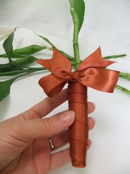 Wrap a test tube with ribbon. Wrap a test tube with ribbon.