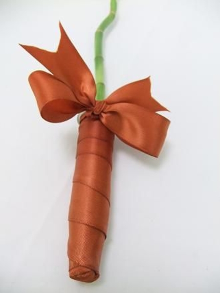 Wrap the bottom and up the test tube with ribbon. Wrap the bottom and up the test tube with ribbon.