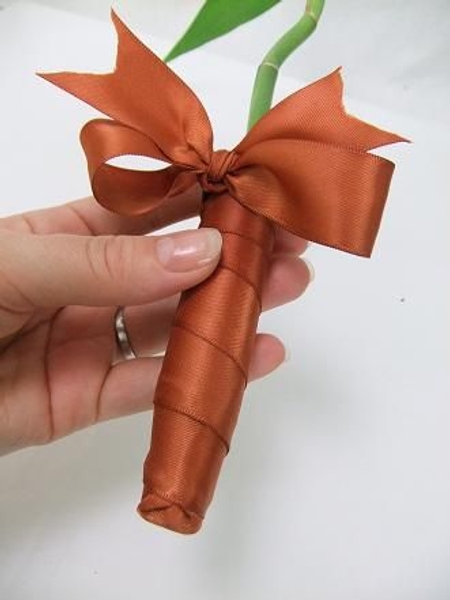 You can use the same technique to wrap a bouquet or posy stems with ribbon You can use the same technique to wrap a bouquet or posy stems with ribbon
