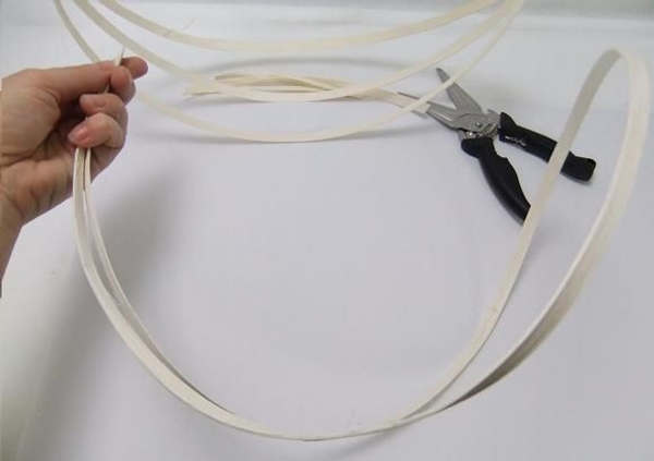 Fold a long coil in half to find the middle point. Fold a long coil in half to find the middle point.