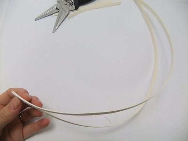 Follow the natural curve of the coils to shape a half moon. Follow the natural curve of the coils to shape a half moon.