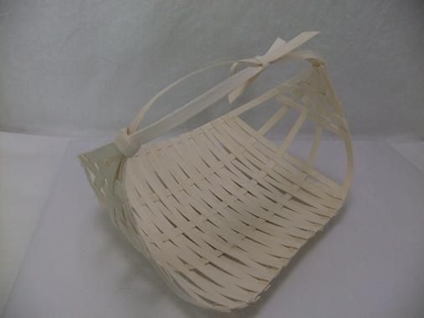 Midelino cane coil flat harvest basket.