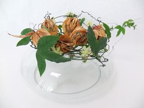 Stage the design on an upturned glass vase Stage the design on an upturned glass vase