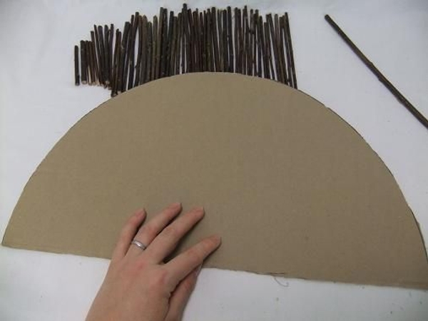Use a cardboard half-moon as a template. Use a cardboard half-moon as a template.