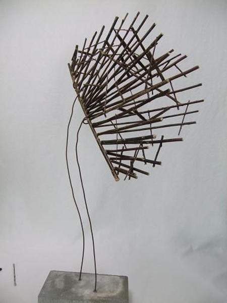 Wire the armature to a stand. Wire the armature to a stand.