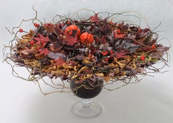 A rosette of fall leaves to celebrate the beauty of autumn A rosette of fall leaves to celebrate the beauty of autumn