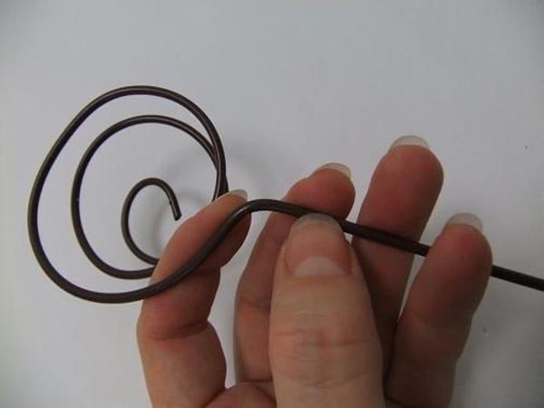 Bend the wire out. Bend the wire out.