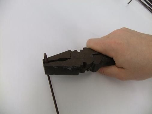 Curl a heavy duty wire. Curl a heavy duty wire.