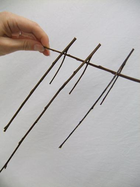 Cut a twig with a fork in it for each lantern to create a natural hook