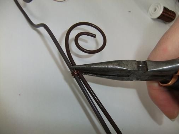 Cut the wire short and fold any sharp ends in Cut the wire short and fold any sharp ends in